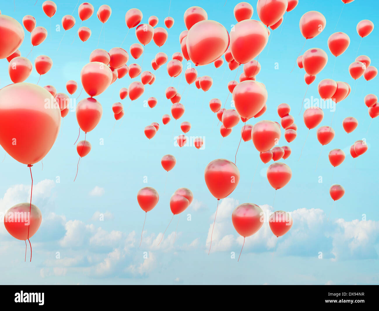 Centinaia di piccole rosso palloncini volanti Foto Stock
