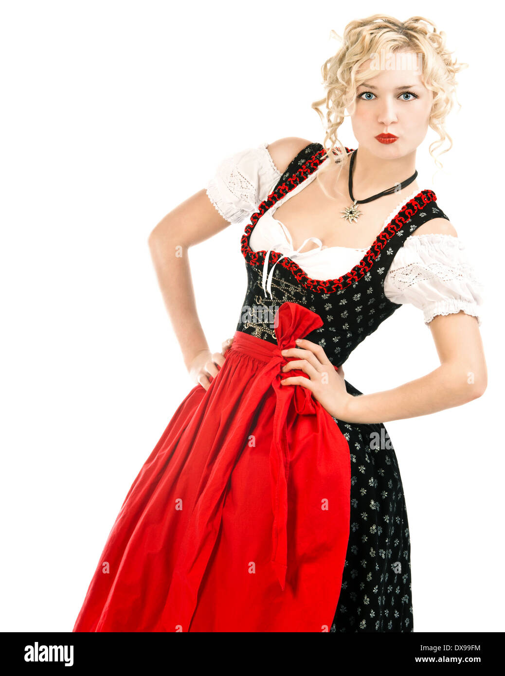 Donna tedesca in tipico abito bavarese dirndl su sfondo bianco. Oktoberfest  Foto stock - Alamy