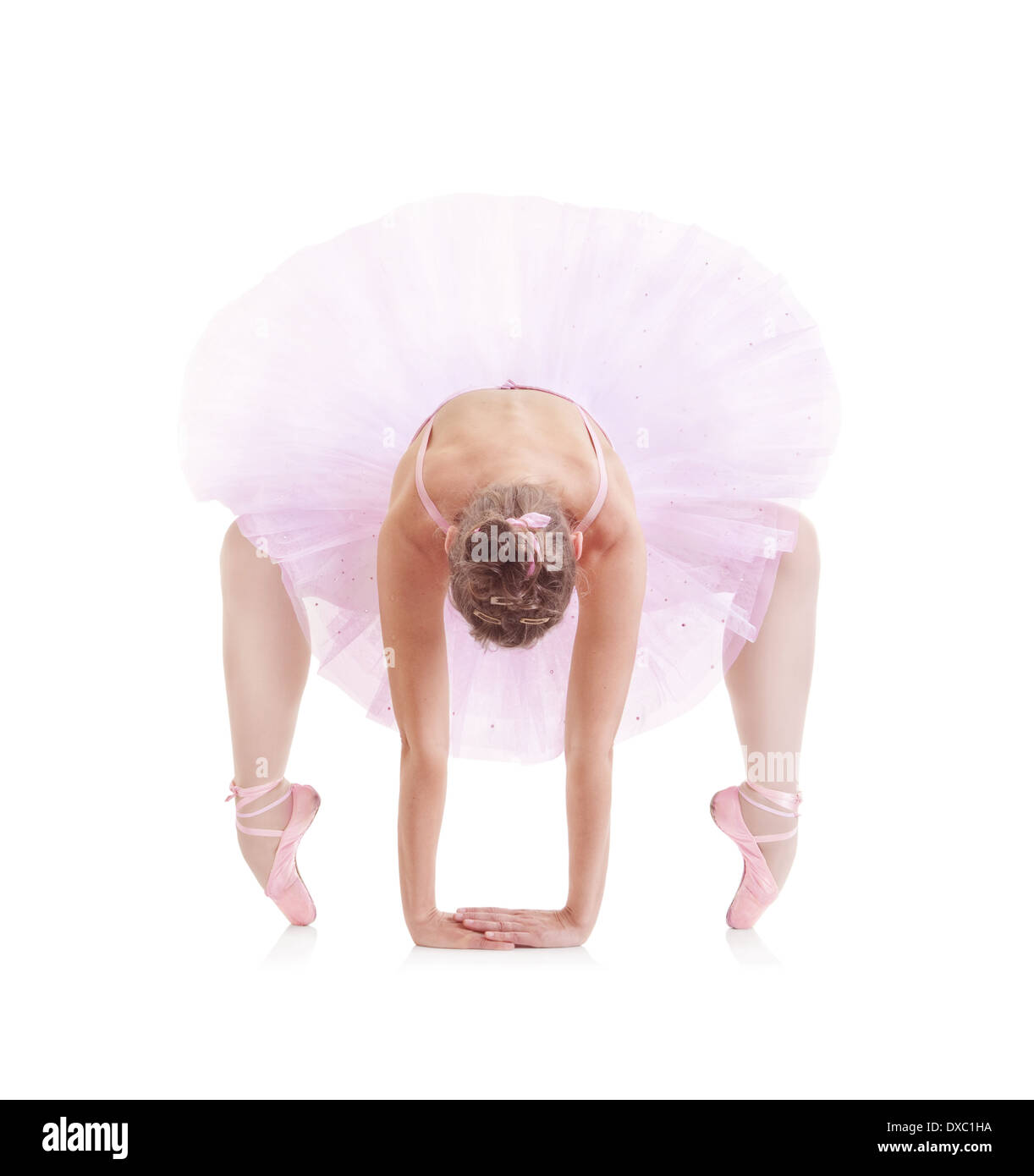 Bellissima ballerina classica in tutù rosa su sfondo bianco Foto Stock