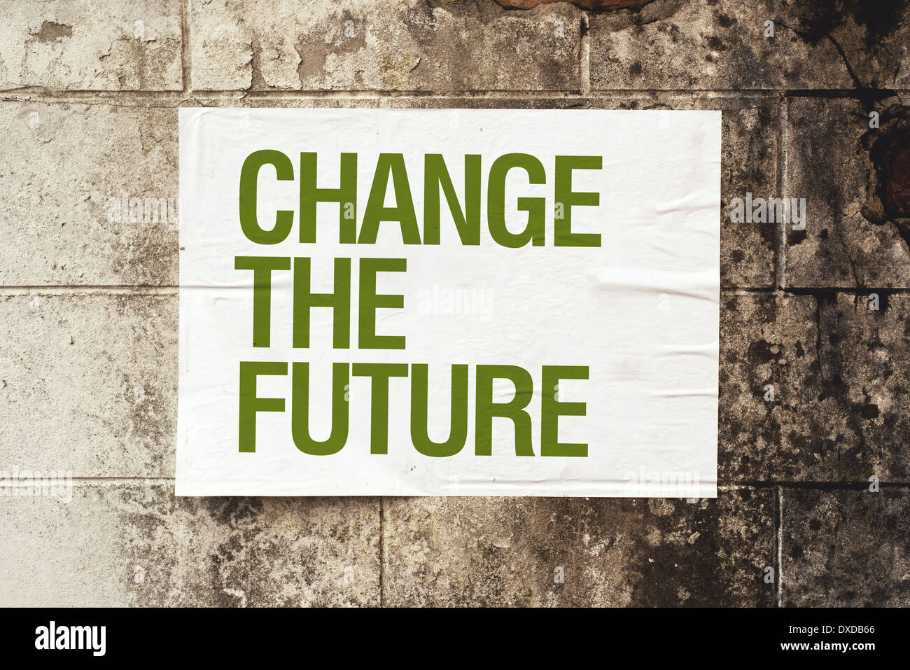 Cambiare il futuro poster sulla parete grunge. Immagine concettuale. Foto Stock