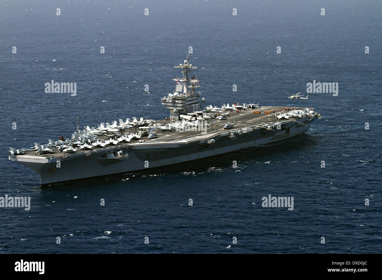 US Navy Nimitz-nucleari classe portaerei USS George H.W. Bush durante un giro di affari di responsabilità Marzo 22, 2014 nel Mare Arabico. Foto Stock