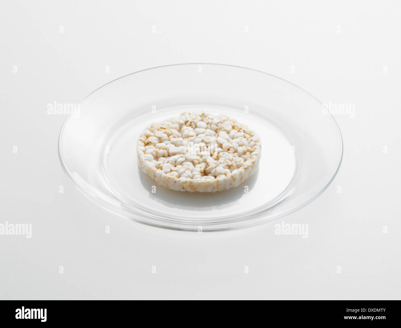 Torta di riso sulla lastra di vetro, Studio Shot Foto Stock