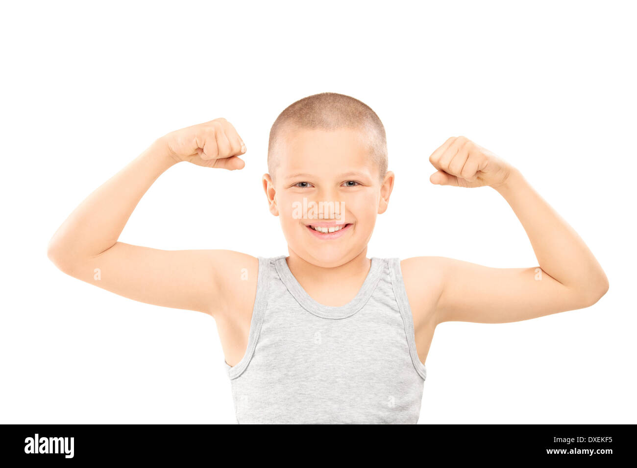 Little Boy che mostra i muscoli Foto Stock