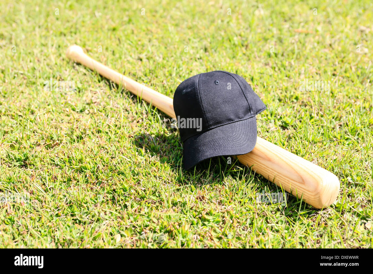 Concetto foto di una mazza da baseball e cappello nero Foto Stock