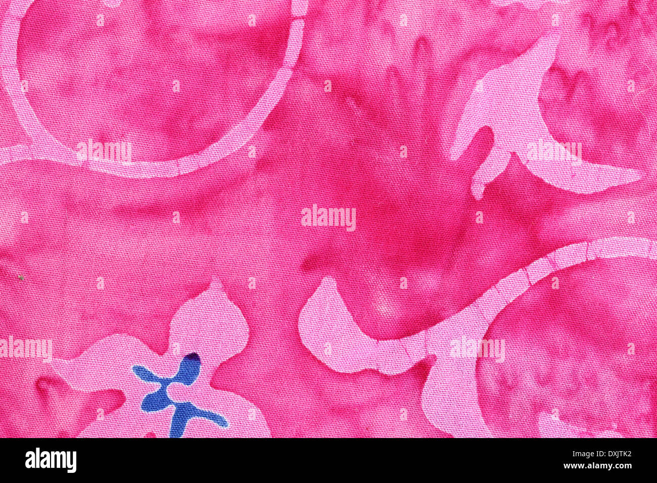 Modello di colore rosa sul tessuto di sfondo. Foto Stock