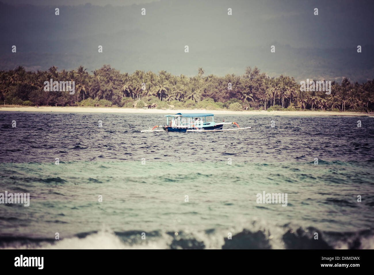 Indonesia, Lombok, traditionell barca da pesca, in background Isola Gili Air Foto Stock