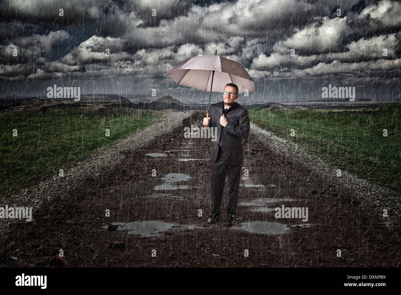 Triste imprenditore e giorno di pioggia Foto Stock