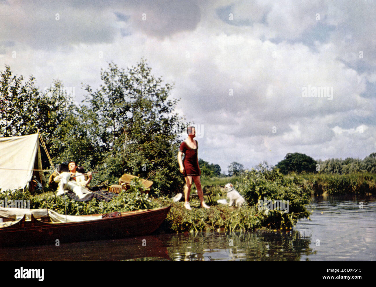 Tre uomini in una barca Foto Stock