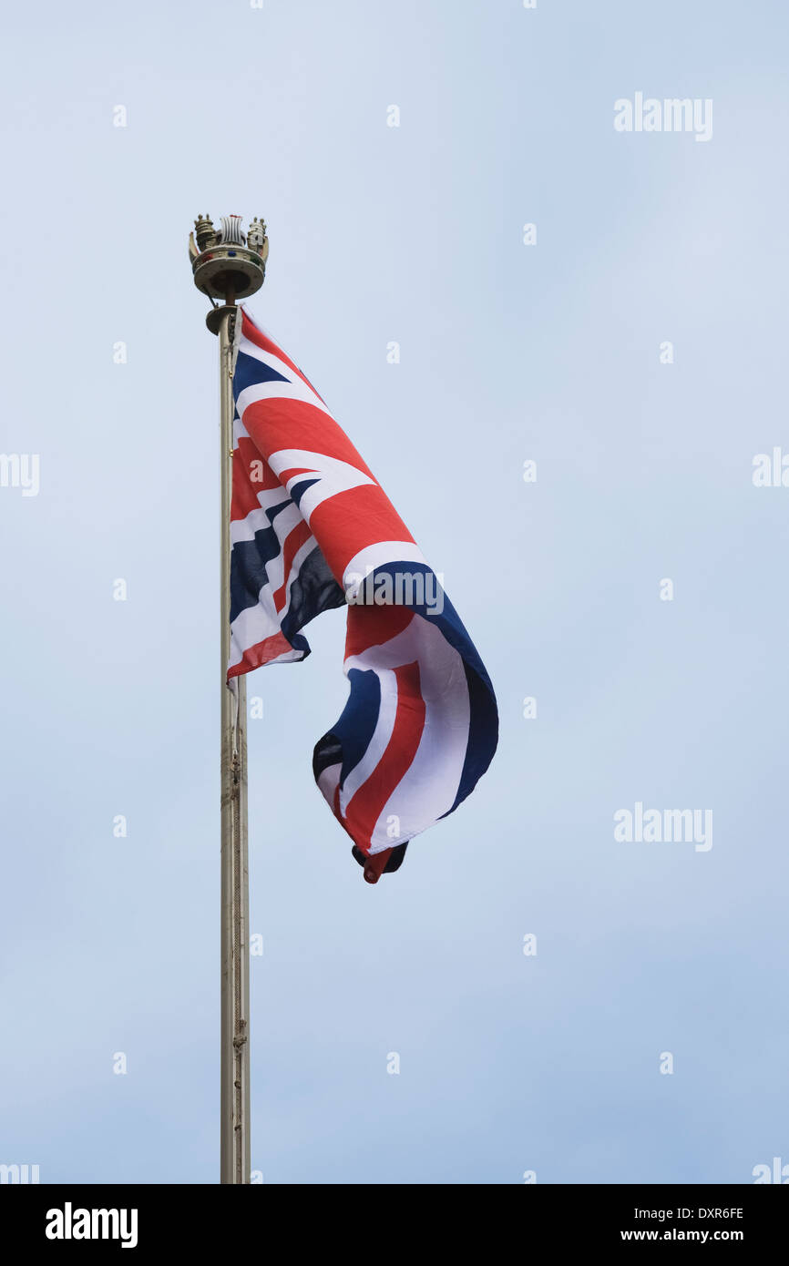 Britannica Union Jack flag su un palo di bandiera Foto Stock