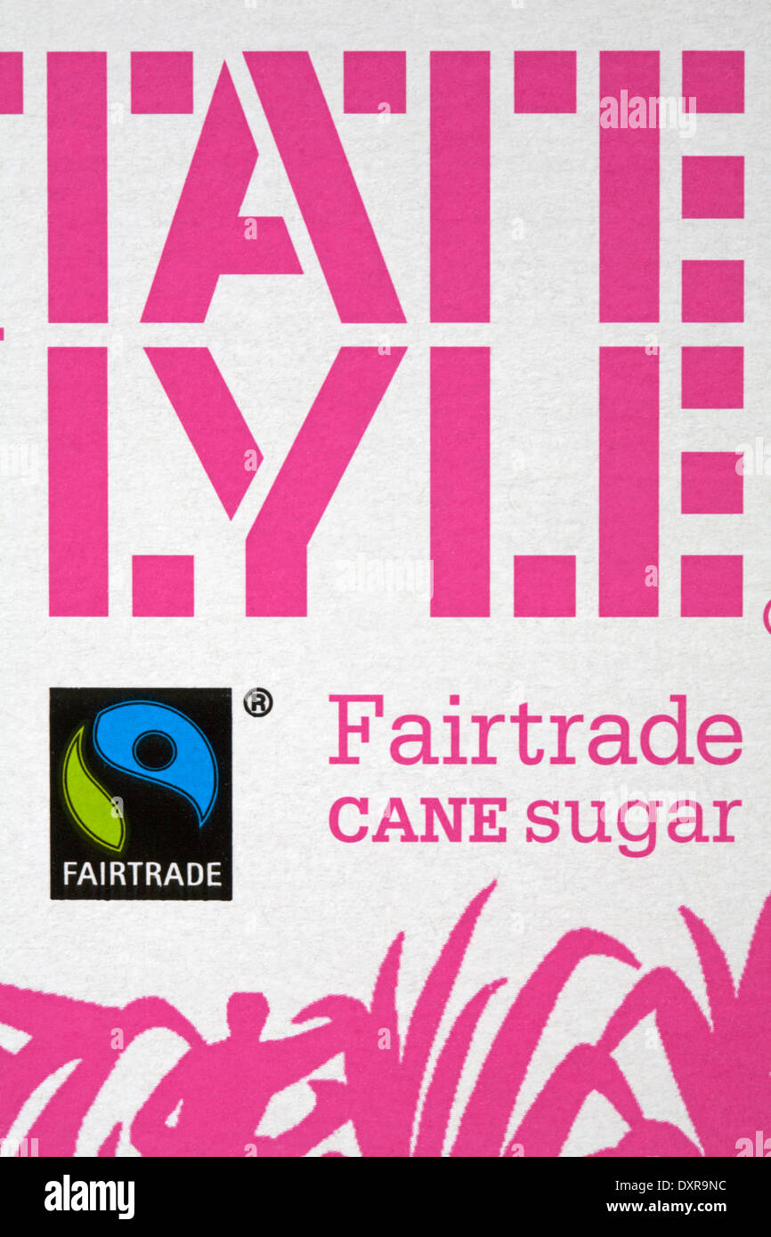Fairtrade zucchero di canna - informazioni sul pacchetto di Tate and Lyle zucchero di canna Fairtrade - simbolo del logo del commercio equo e solidale Foto Stock