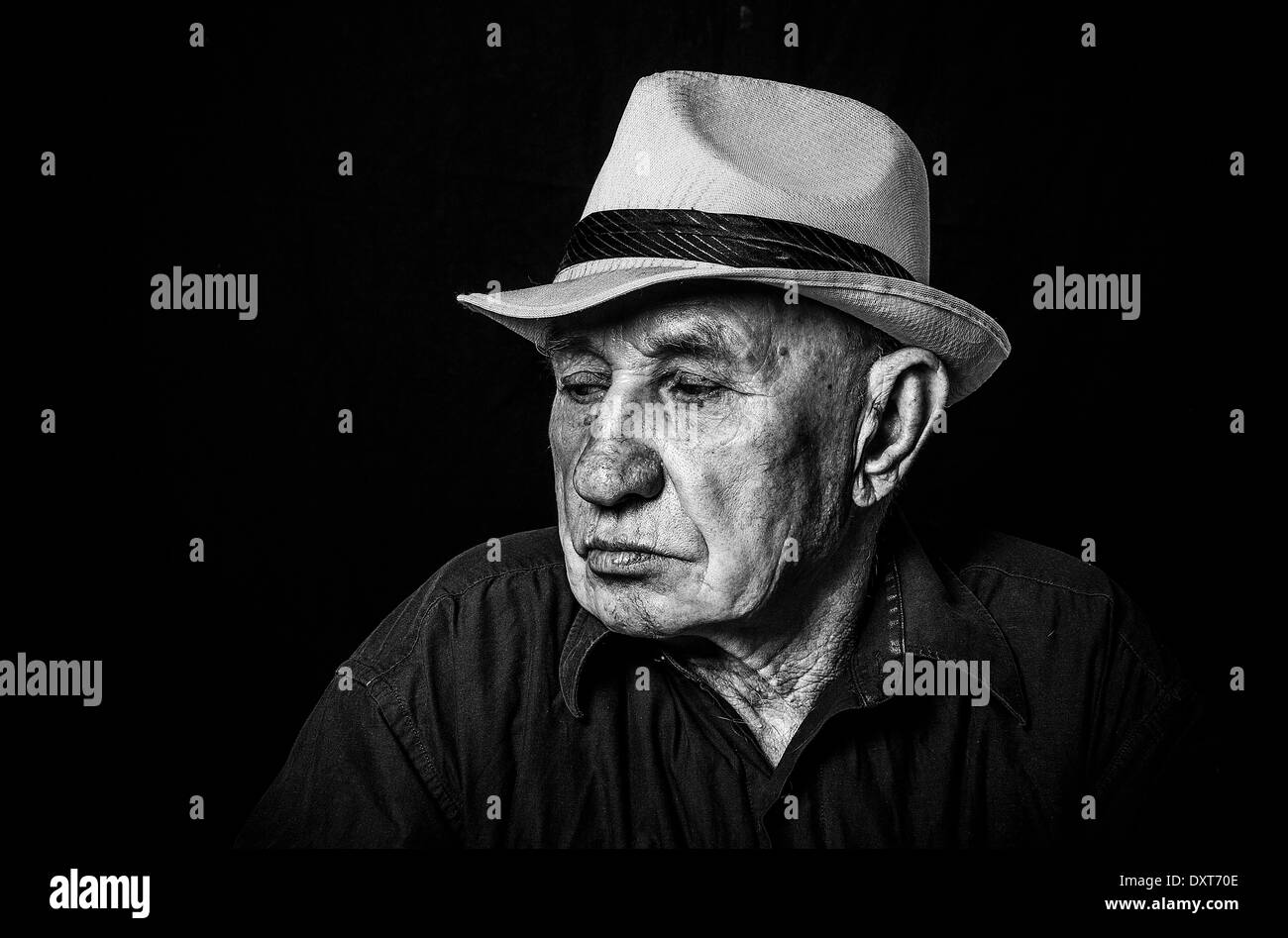 Ritratto artistico di un vecchio in un cappello Foto Stock
