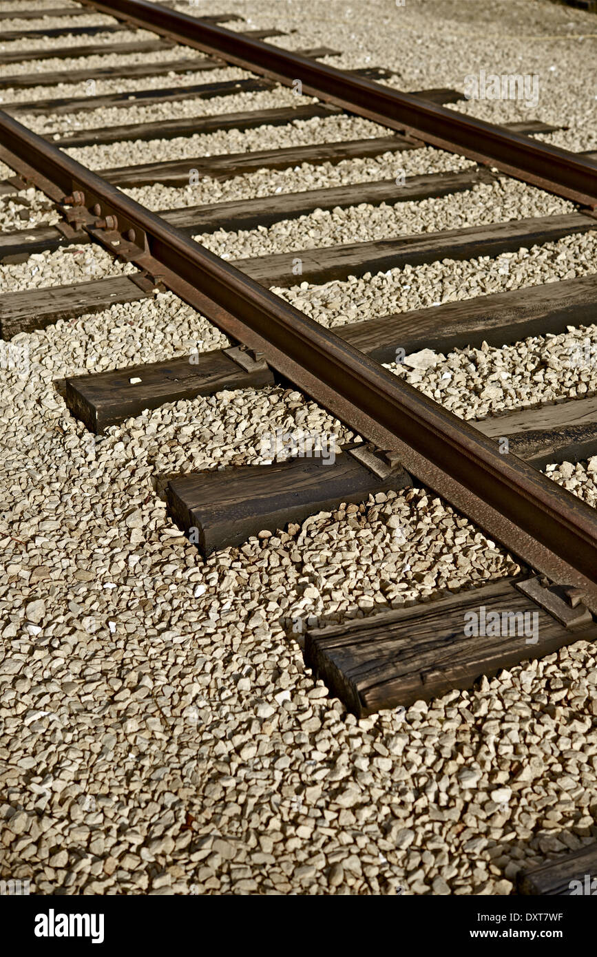 I binari della ferrovia Closeup fotografia verticale. Ferrovie Raccolta foto. Foto Stock