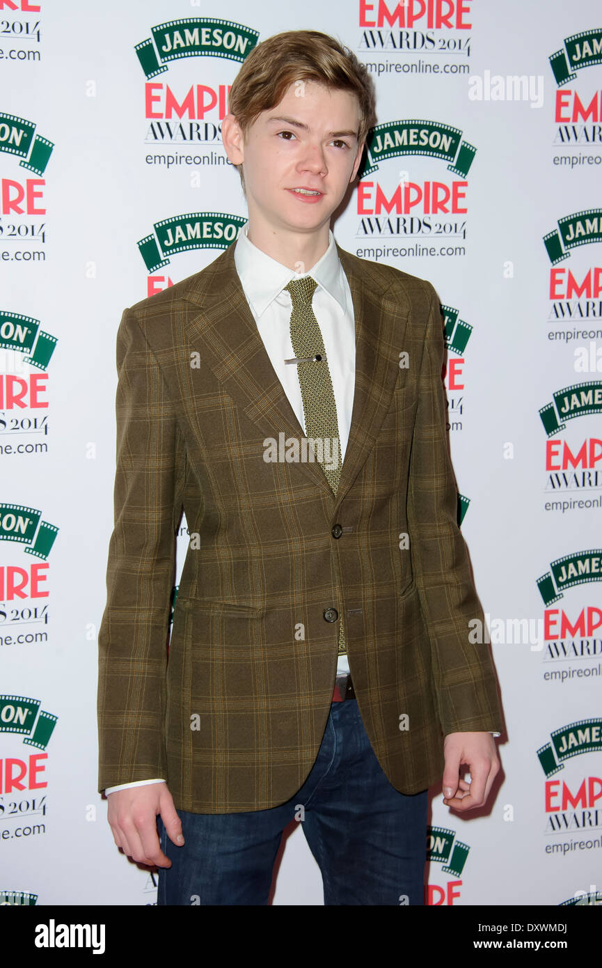 Thomas Brodie-Sangster arriva l'Empire Awards. Foto Stock