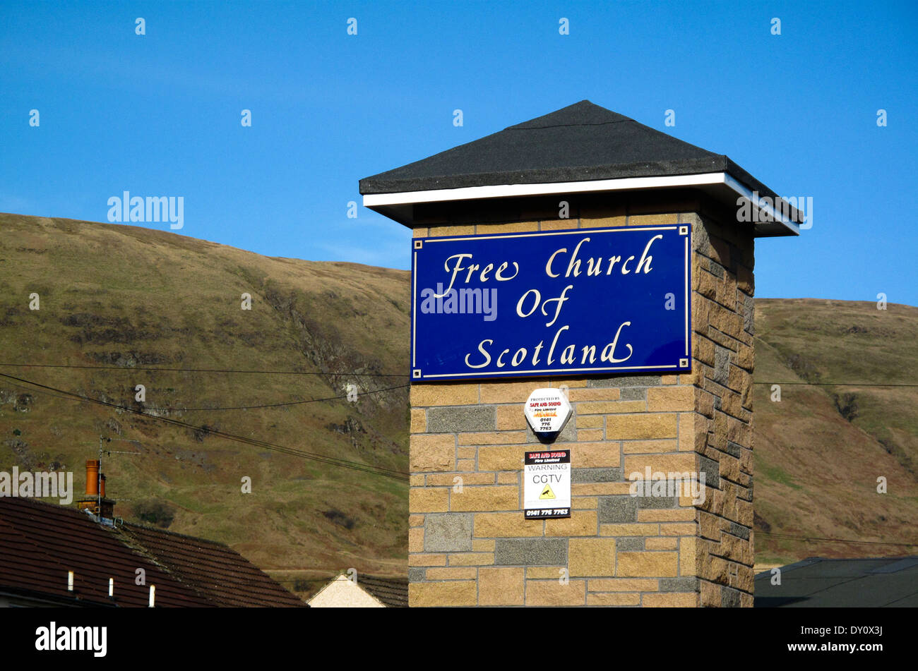 Segno e la torretta sulla libera Chiesa di Scozia edificio Foto Stock