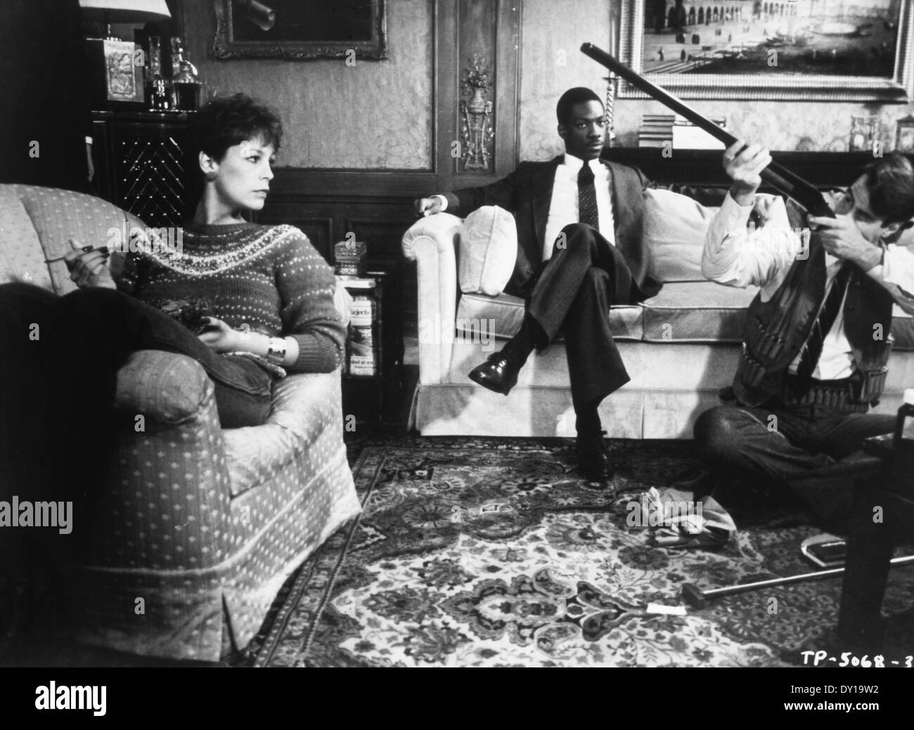 Jamie Lee Curtis, Eddie Murphy e Dan Aykroyd, sul set del film "Trading Places', 1983 Foto Stock