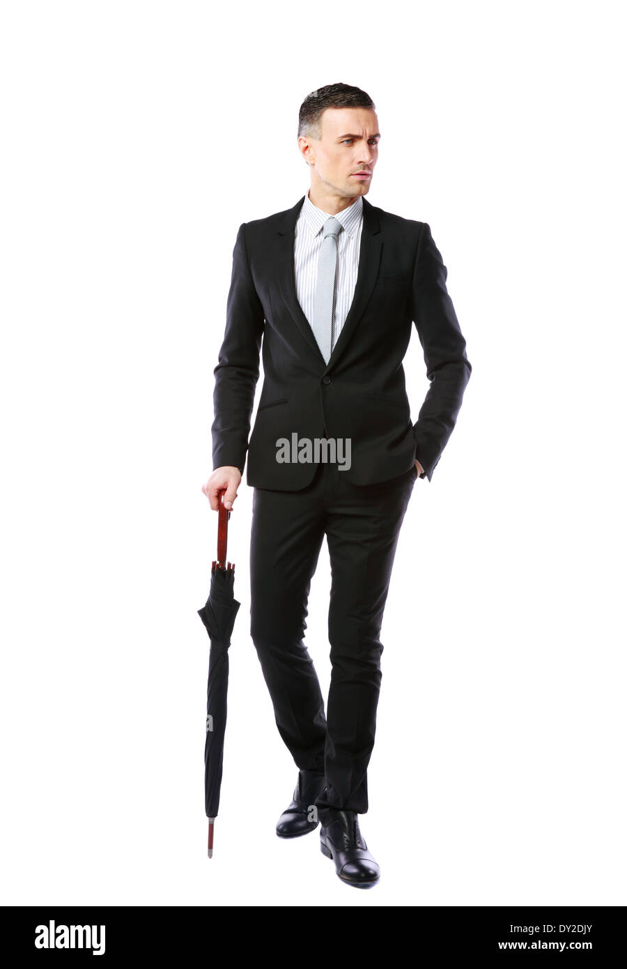 Ritratto a figura intera di un imprenditore con ombrello su sfondo bianco Foto Stock