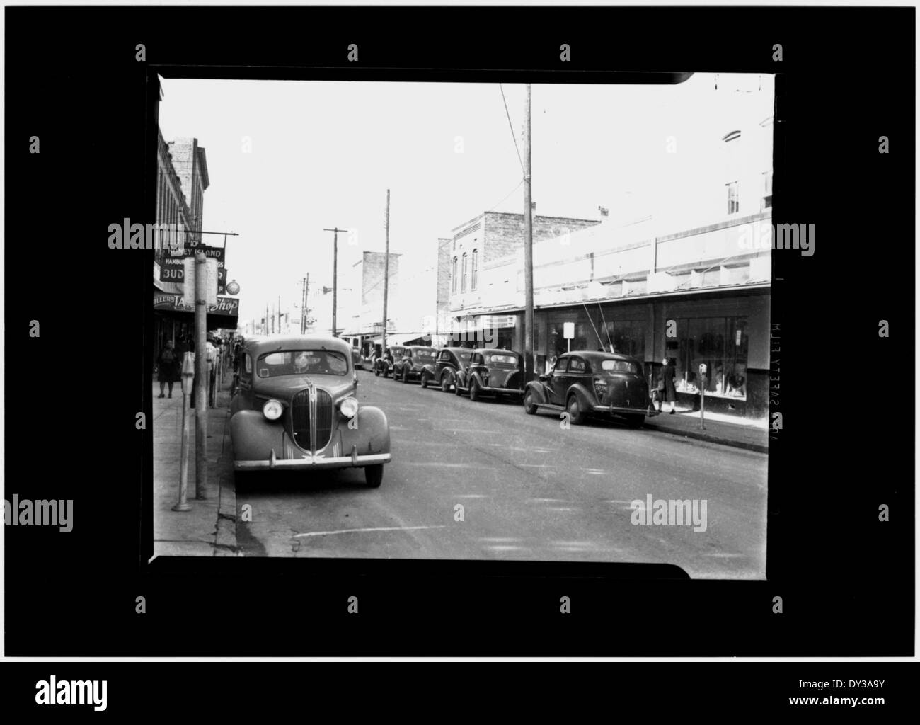 Una fotografia scattata il 21 marzo 1944 di Farish Street, Jackson, Mississippi, cattura la vivace comunità e la vita urbana del tempo. Foto Stock