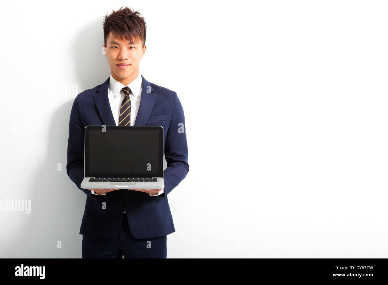 Imprenditore professionale utilizzando un computer portatile a fare Foto Stock