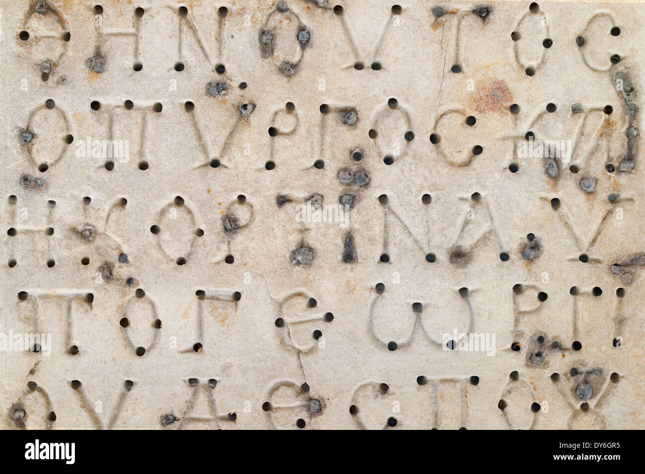 Gli sfondi e texture: iscrizioni in greco su una lastra di marmo, testo abstract Foto Stock