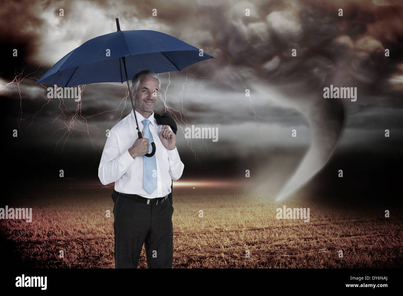 Immagine composita di happy businessman holding ombrello Foto Stock