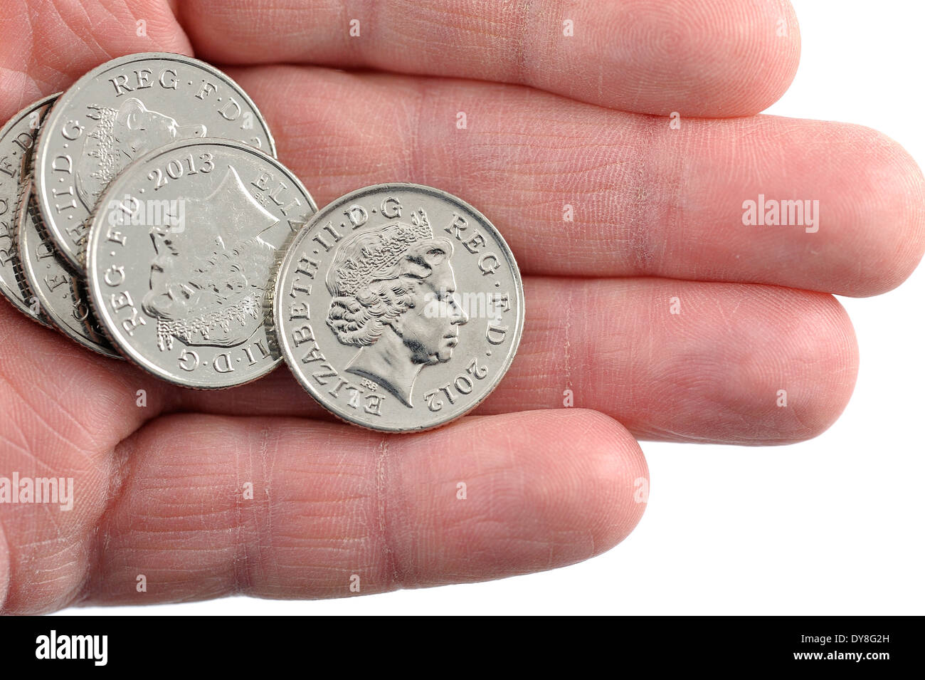 Shiny 10 pence monete del Regno Unito mostra il Queens Head a faccia in su Foto Stock