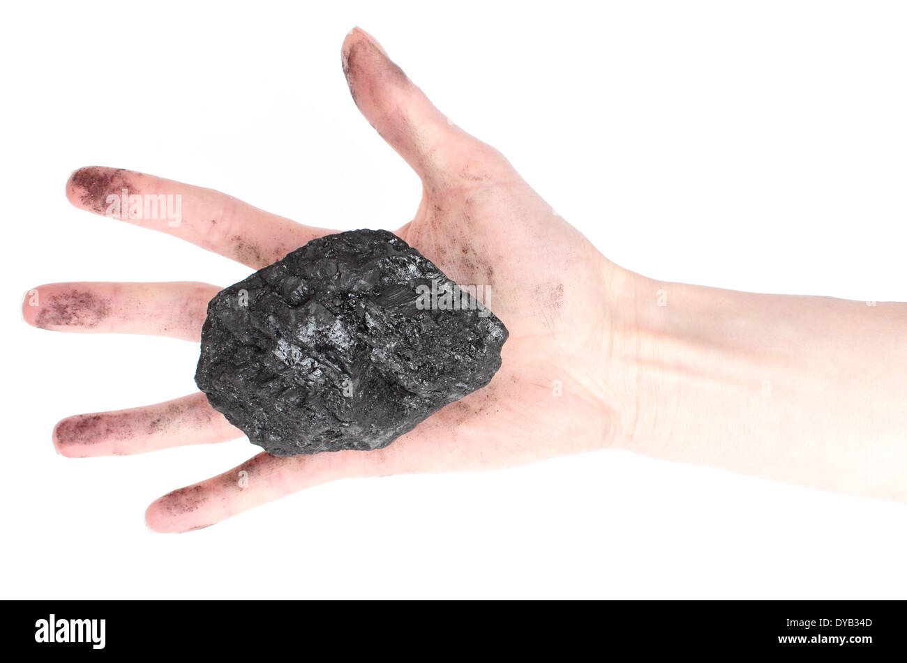 Donna con mano grumo di carbone su sfondo bianco Foto Stock