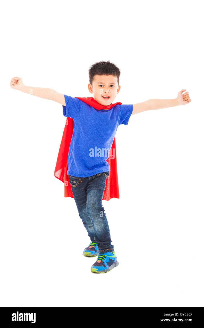 Il supereroe kid in piedi in studio Foto Stock