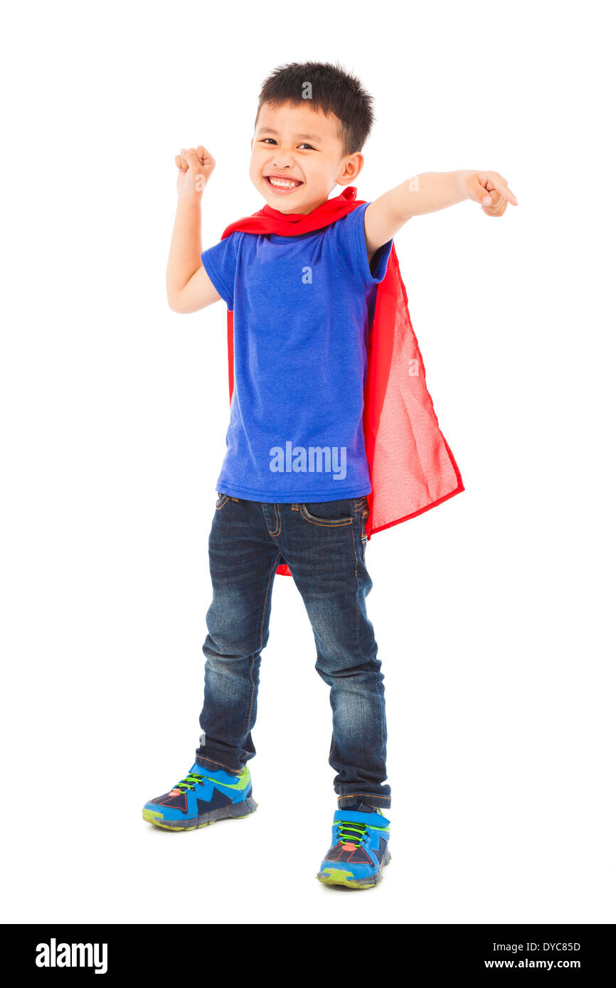 Il supereroe kid in piedi in studio Foto Stock