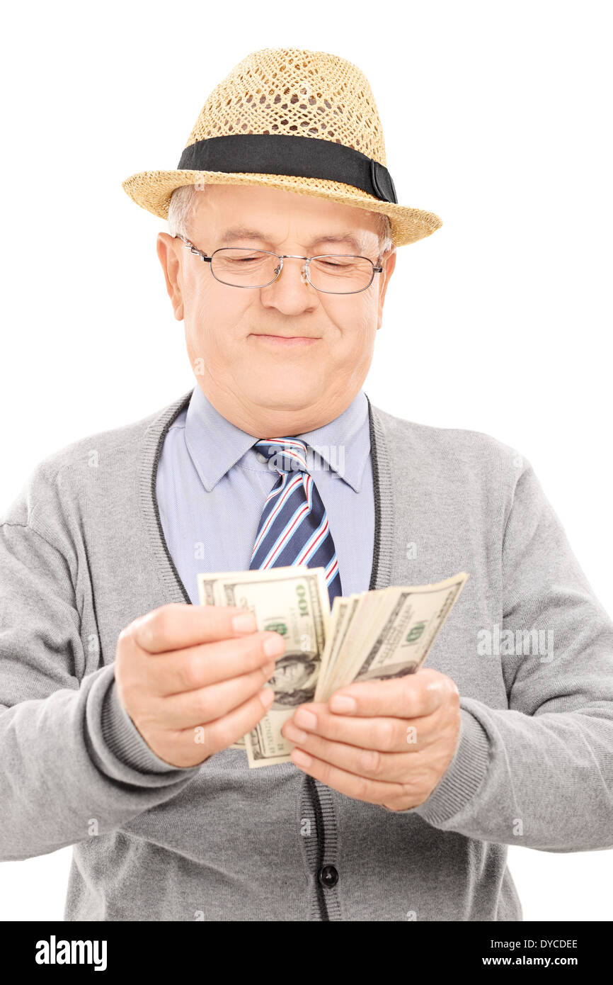 Senior gentleman conteggiare denaro Foto Stock
