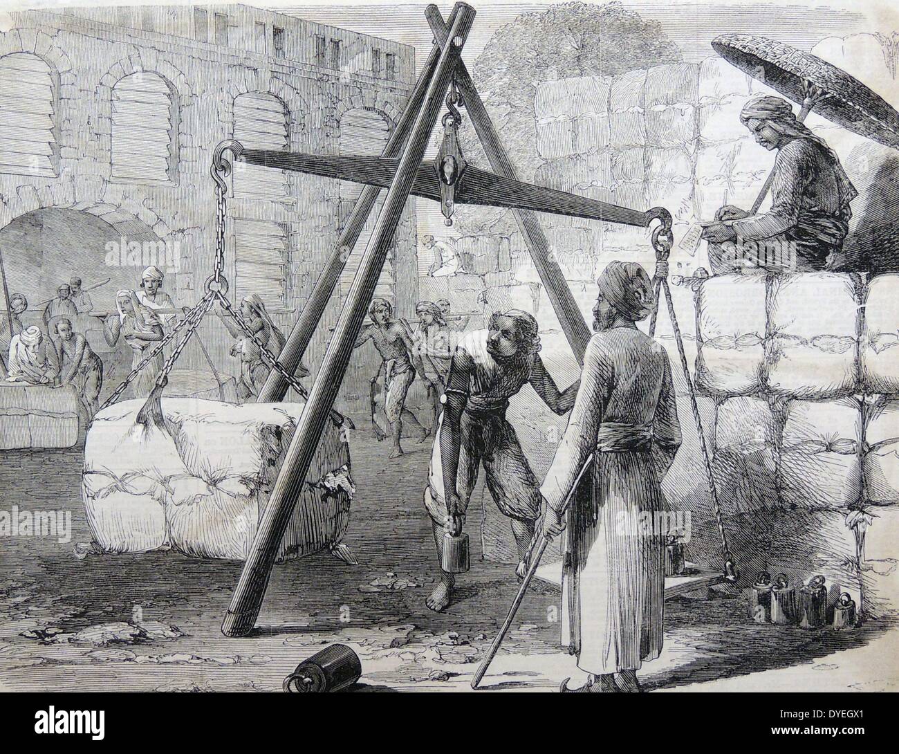 Peso del cotone greggio di balle a Mumbai (Bombay), India, prima di esportare in Inghilterra. Xilografia, Londra, 1862. Foto Stock