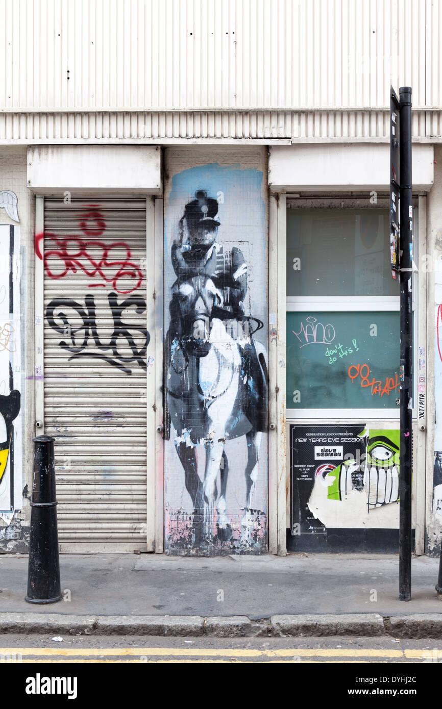 Il declino del West' da artista di strada Conor Harrington, nella zona est di Londra Foto Stock