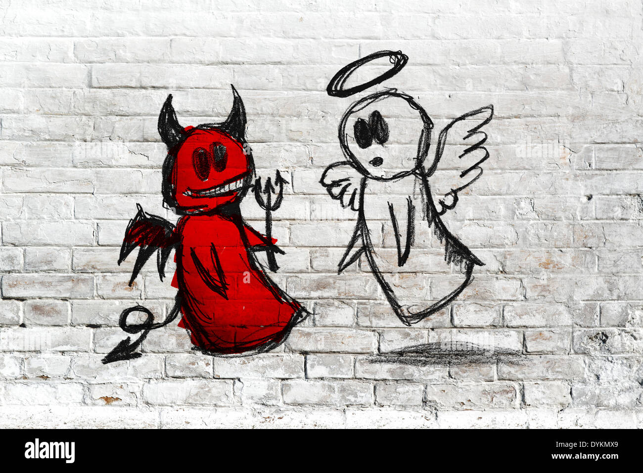 Angelo e diavolo fighting, il bene e il male. Foto Stock