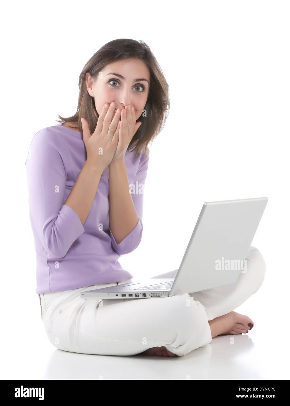 Affannosa donna utilizzando laptop Foto Stock