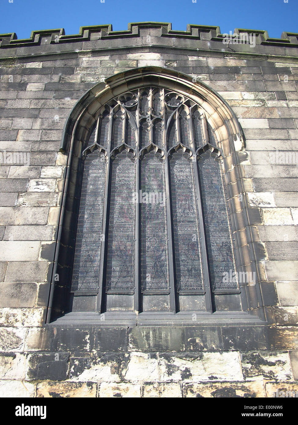 La parte esterna della finestra Flodden a St Leonards chiesa, Middleton, Greater Manchester, Inghilterra. Foto Stock