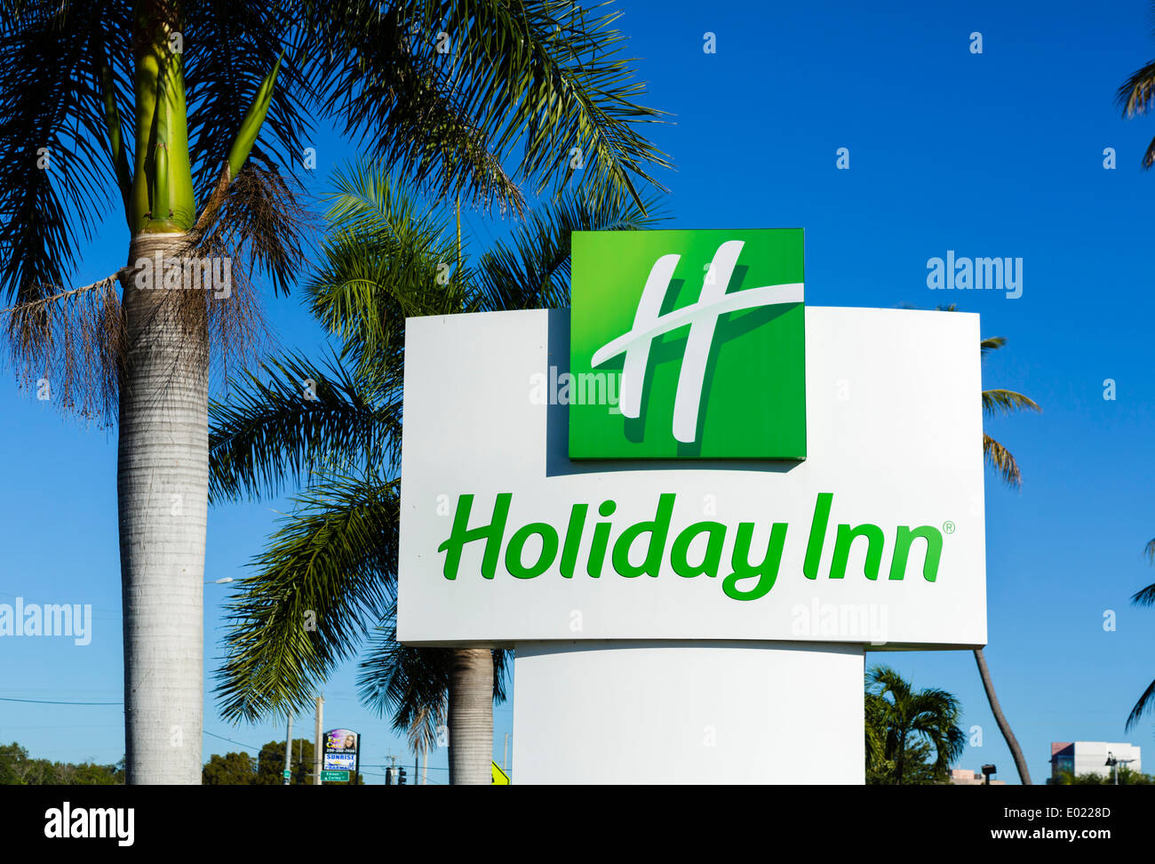 Hotel Holiday Inn hotel di segno e di palme, Florida, Stati Uniti d'America Foto Stock
