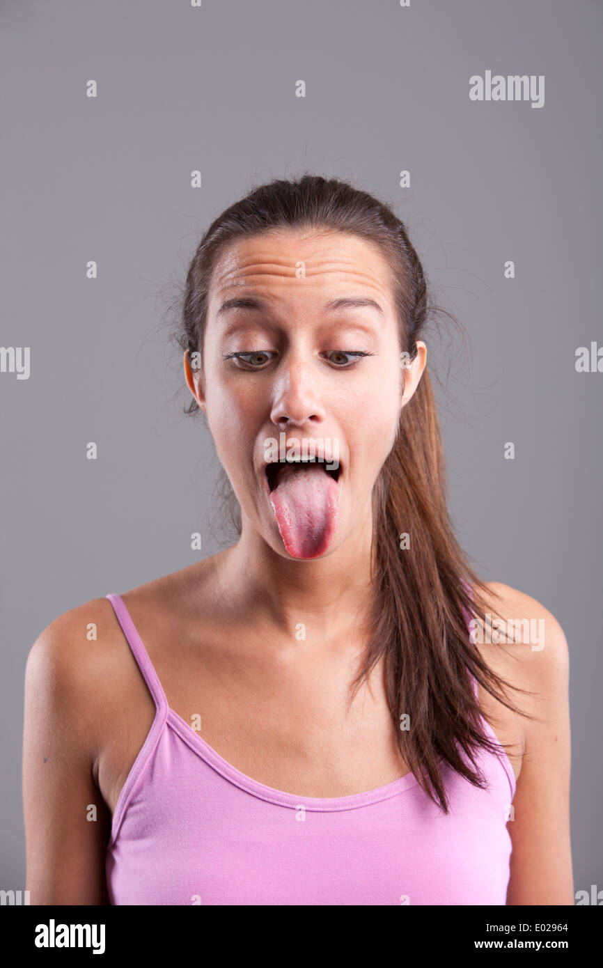 Funny Pretty girl con la linguetta bloccati Foto Stock