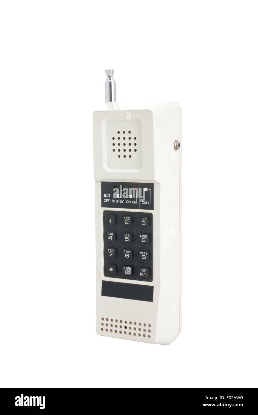 Un bianco telefono cordless dal eigthes con tasti neri e un'antenna telescopica Foto Stock