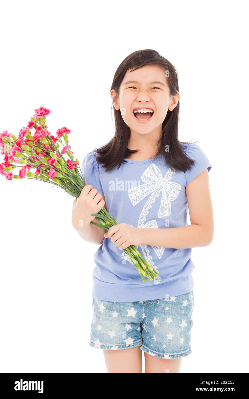 Sorridente bambina tenendo un bouquet del garofano Foto Stock
