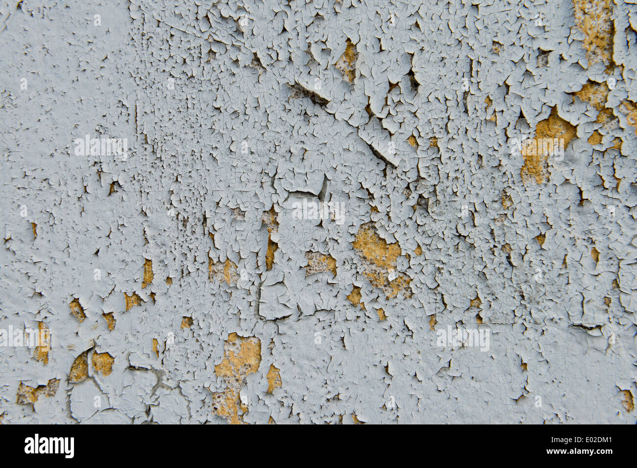 Vecchia vernice incrinata sul muro di cemento Foto Stock