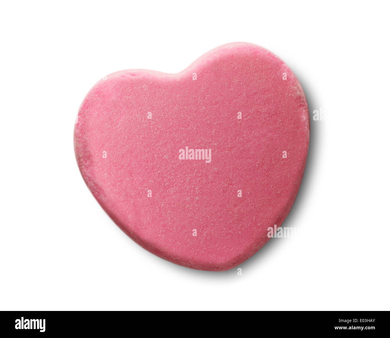 Caramelle rosa Valentines cuore isolato su sfondo bianco. Foto Stock