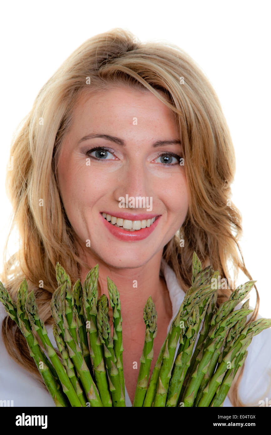 Donna con asparagi verdi, Frau mit gruenem Spargel Foto Stock