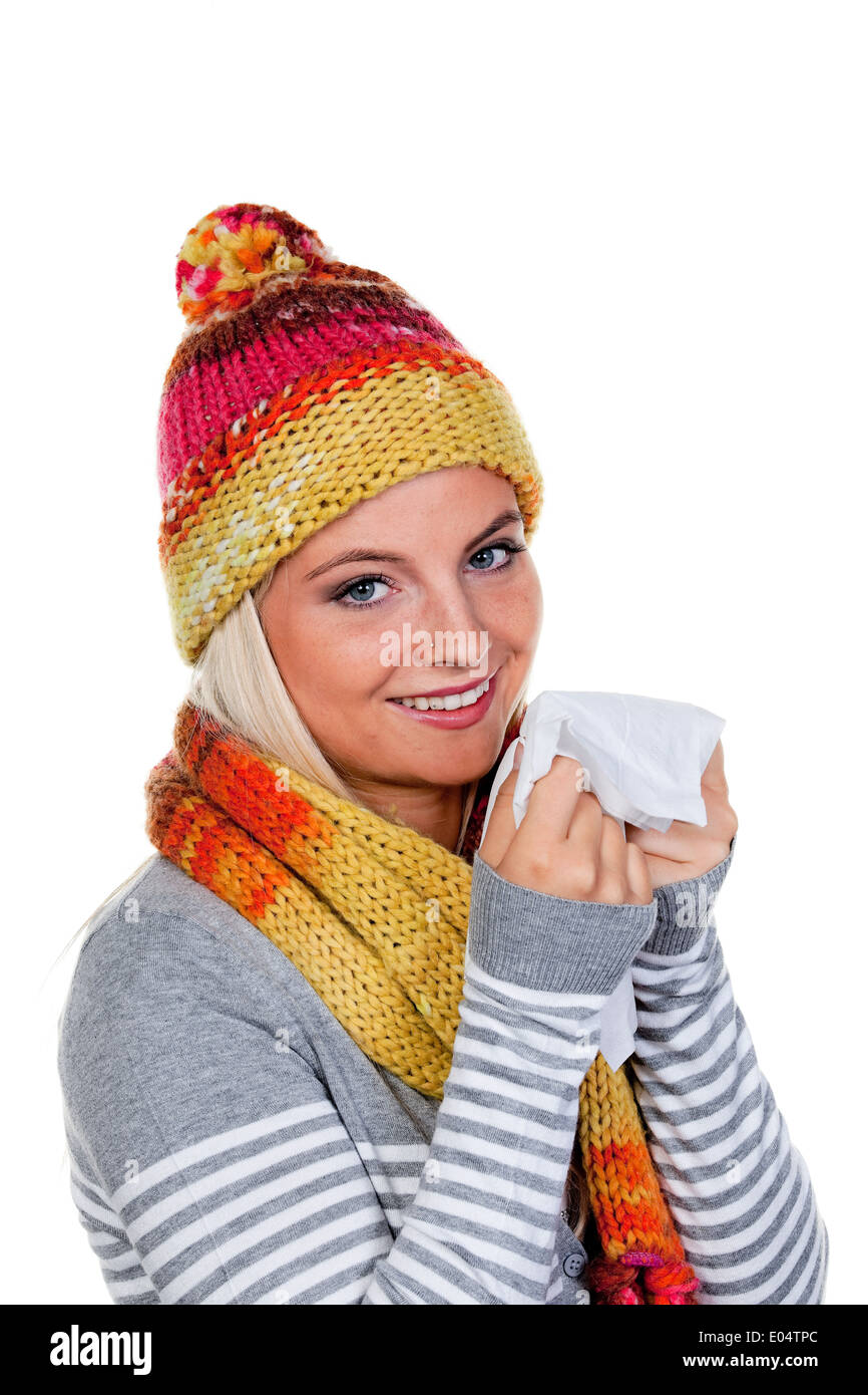 Giovane donna con un freddo e freddo., Junge Frau mit Schnupfen und Erkaeltung. Foto Stock