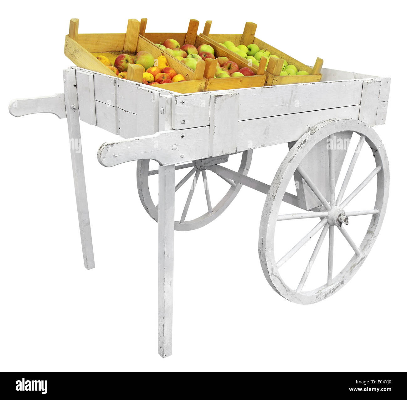 Le mele su un bianco carrello di legno, isolato su sfondo bianco Foto Stock