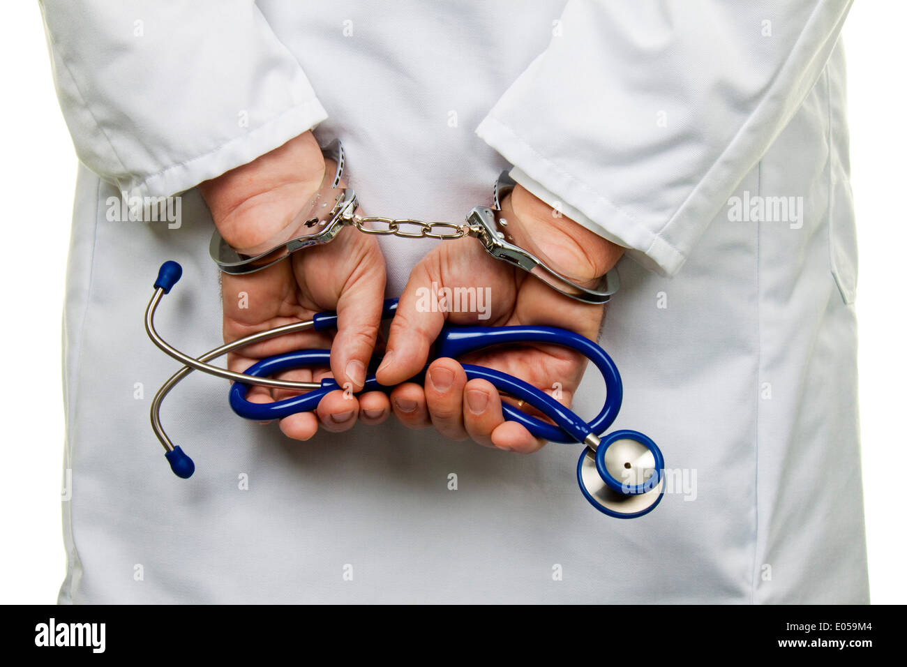 Medico con Stethoskop e manette, Arzt mit Stethoskop und Handschellen Foto Stock