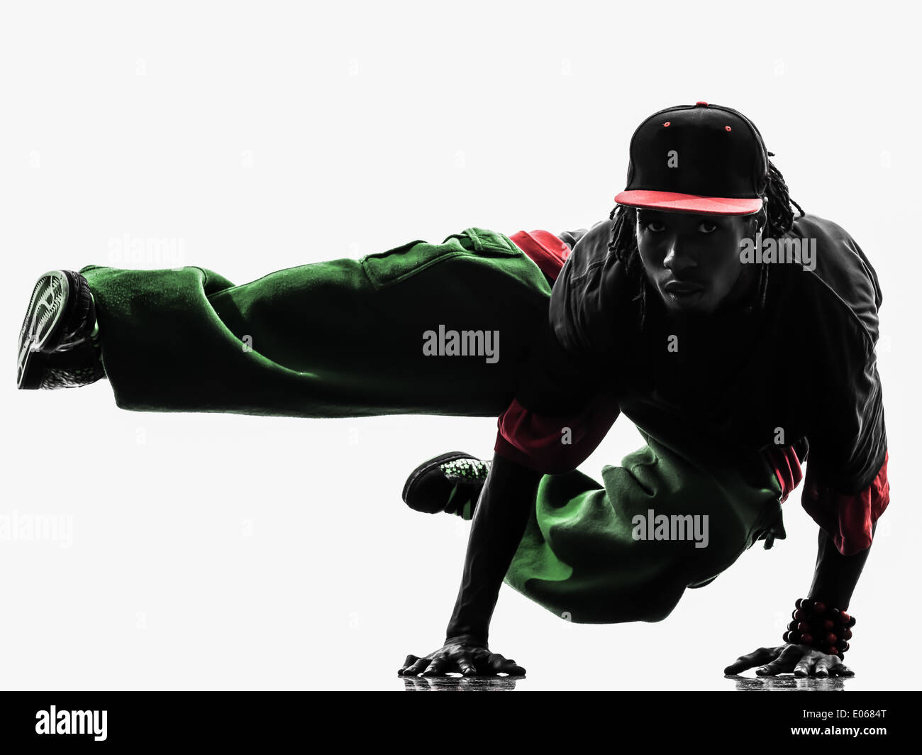 Un hip hop acrobatico ballerino break breakdance giovane handstand silhouette sullo sfondo bianco Foto Stock