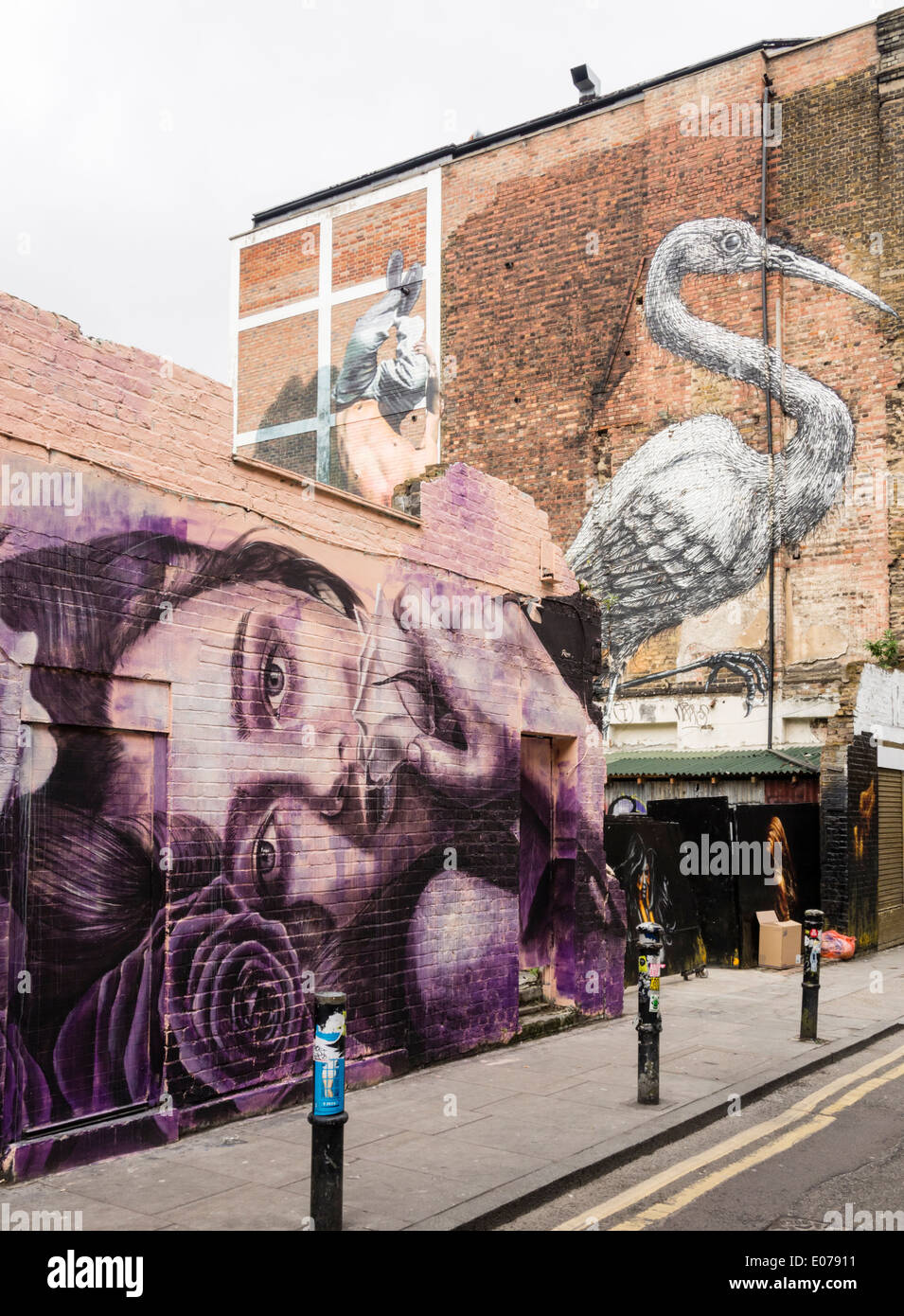 Arte di strada all'angolo di Brick Lane e Hanbury Street da Roa Rone e Martin Ron Foto Stock