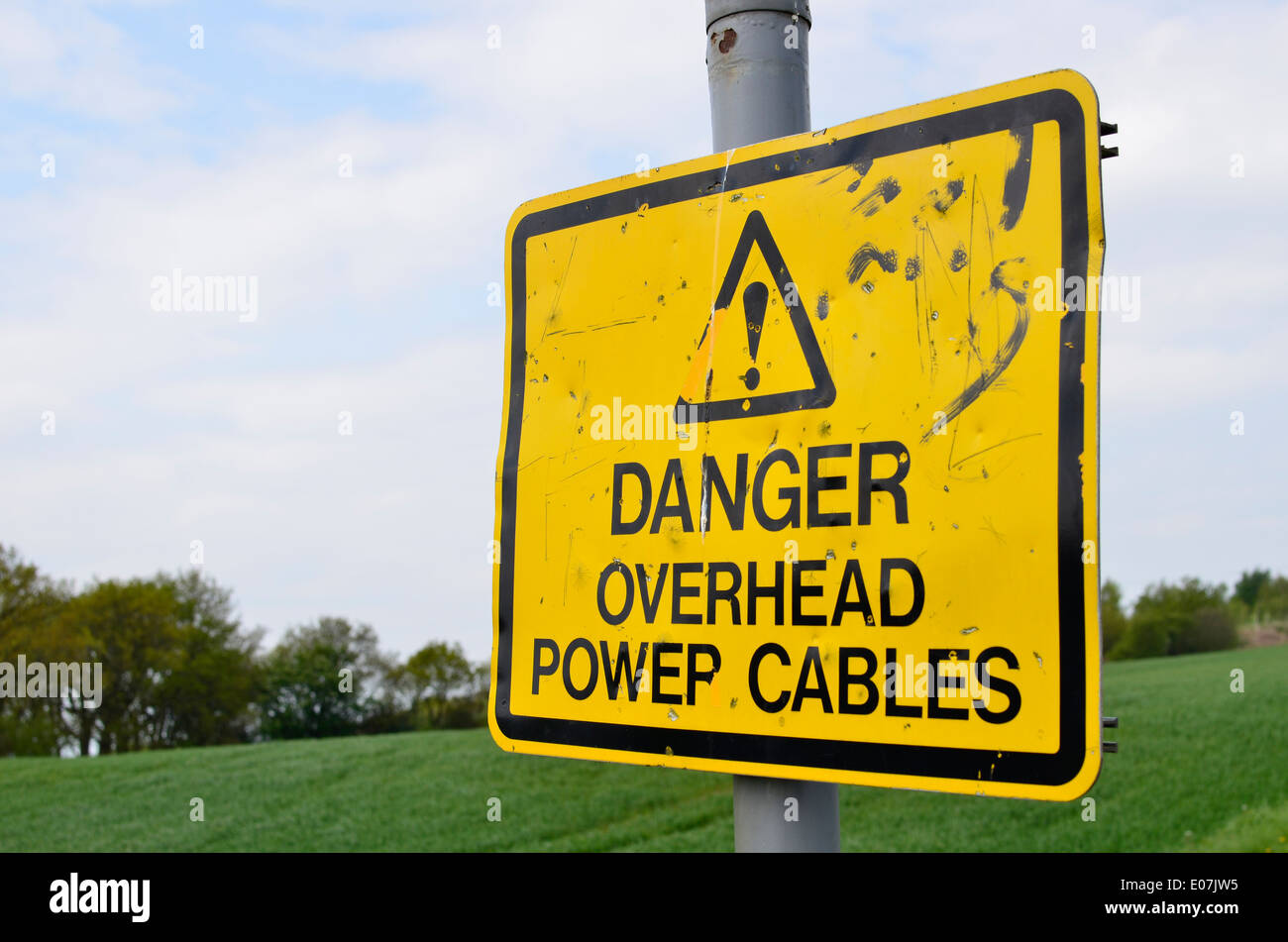 Pericolo di overhead cavi di potenza segno Foto Stock
