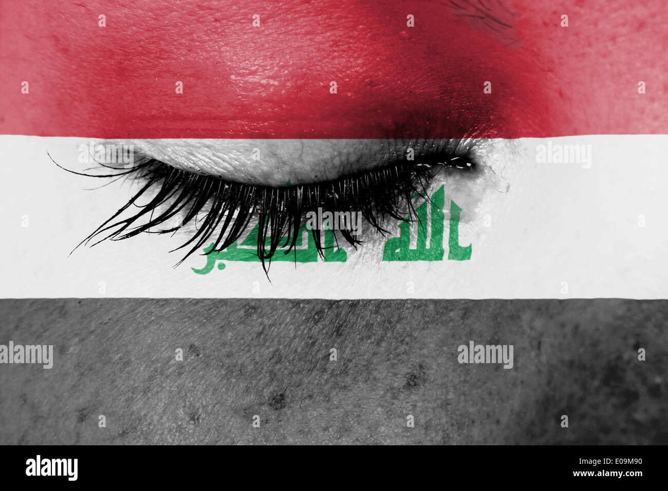 Il pianto della donna il dolore e il cordoglio concetto bandiera dell'Iraq Foto Stock