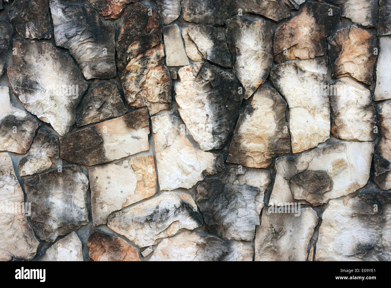 Sfondo di pietra. Il vecchio muro di pietra di granito. Foto Stock