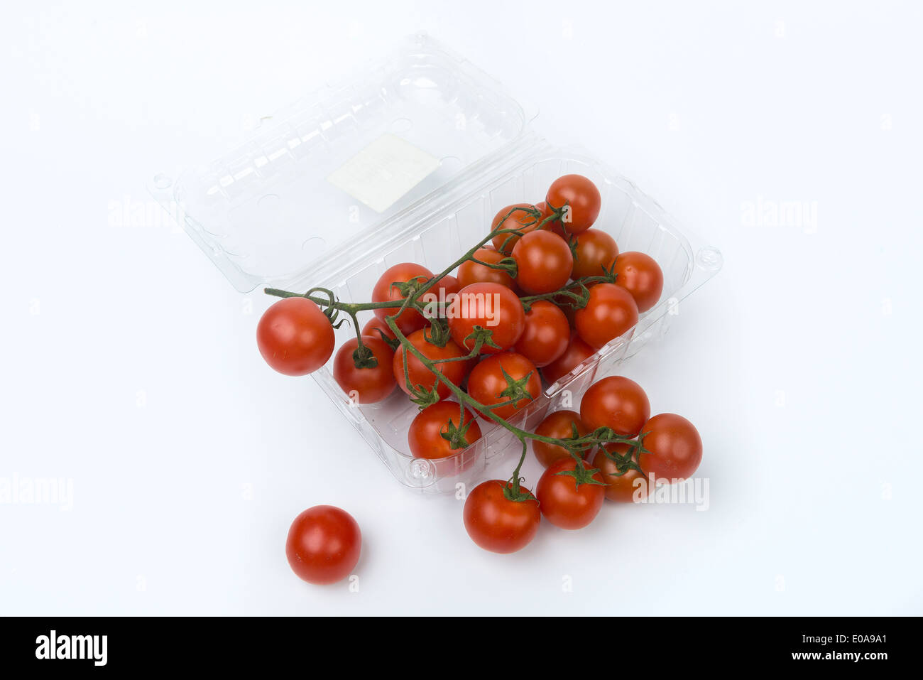 Pomodori in un contenitore trasparente Foto Stock